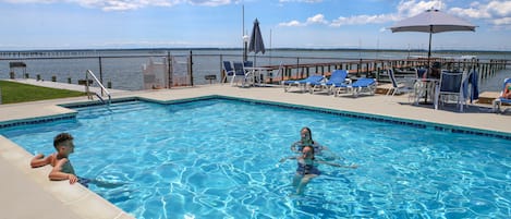 Seasonal outdoor pool, pool loungers