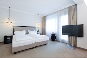 Ropa de cama hipoalergénica y minibar