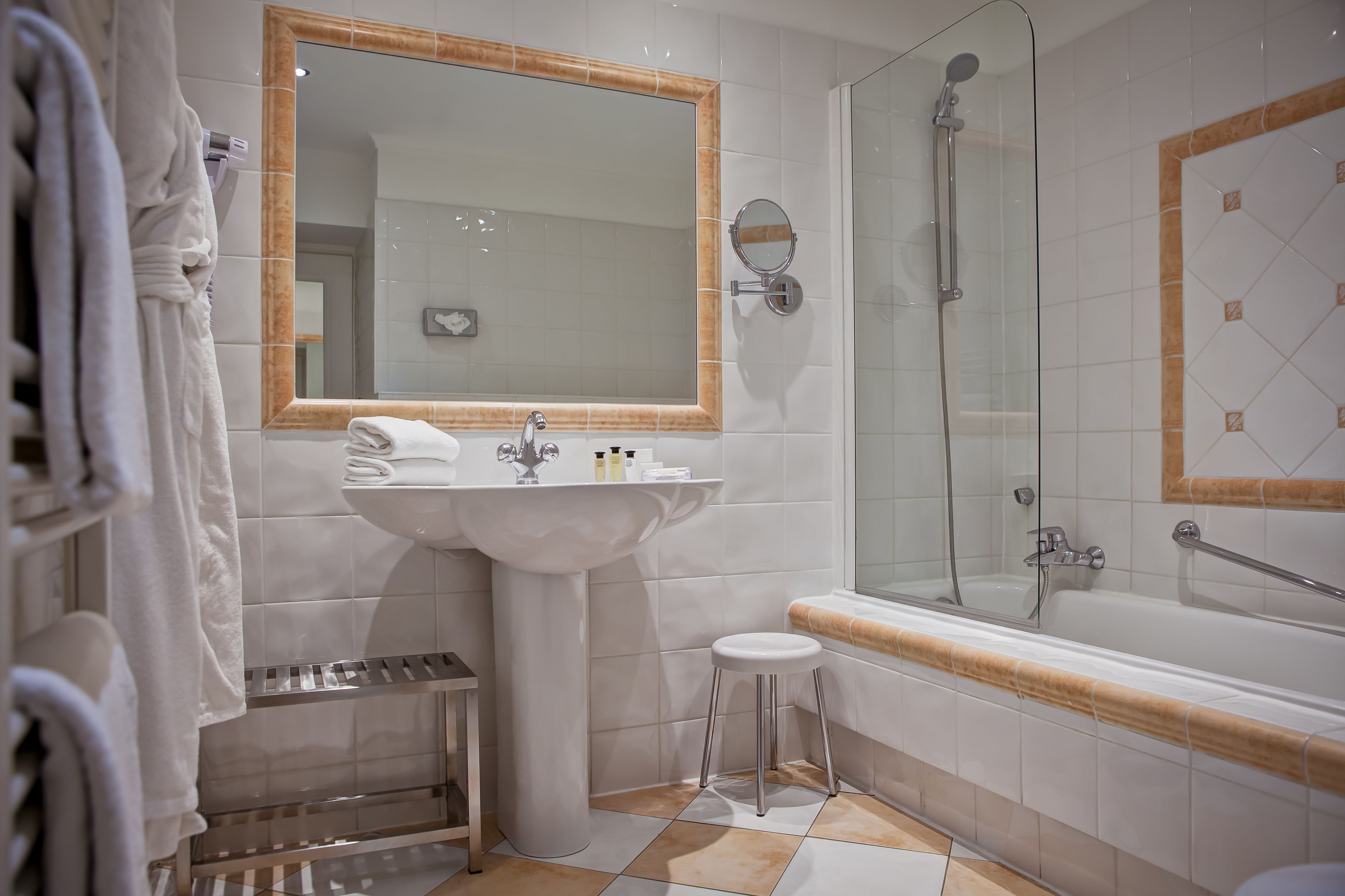 hair dryer, bathrobes, slippers, towels