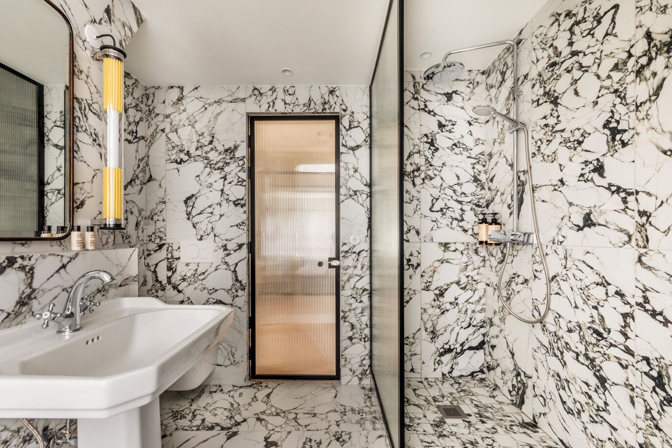 following the roofs of paris | bathroom | shower, rainfall showerhead, designer toiletries, hair dryer