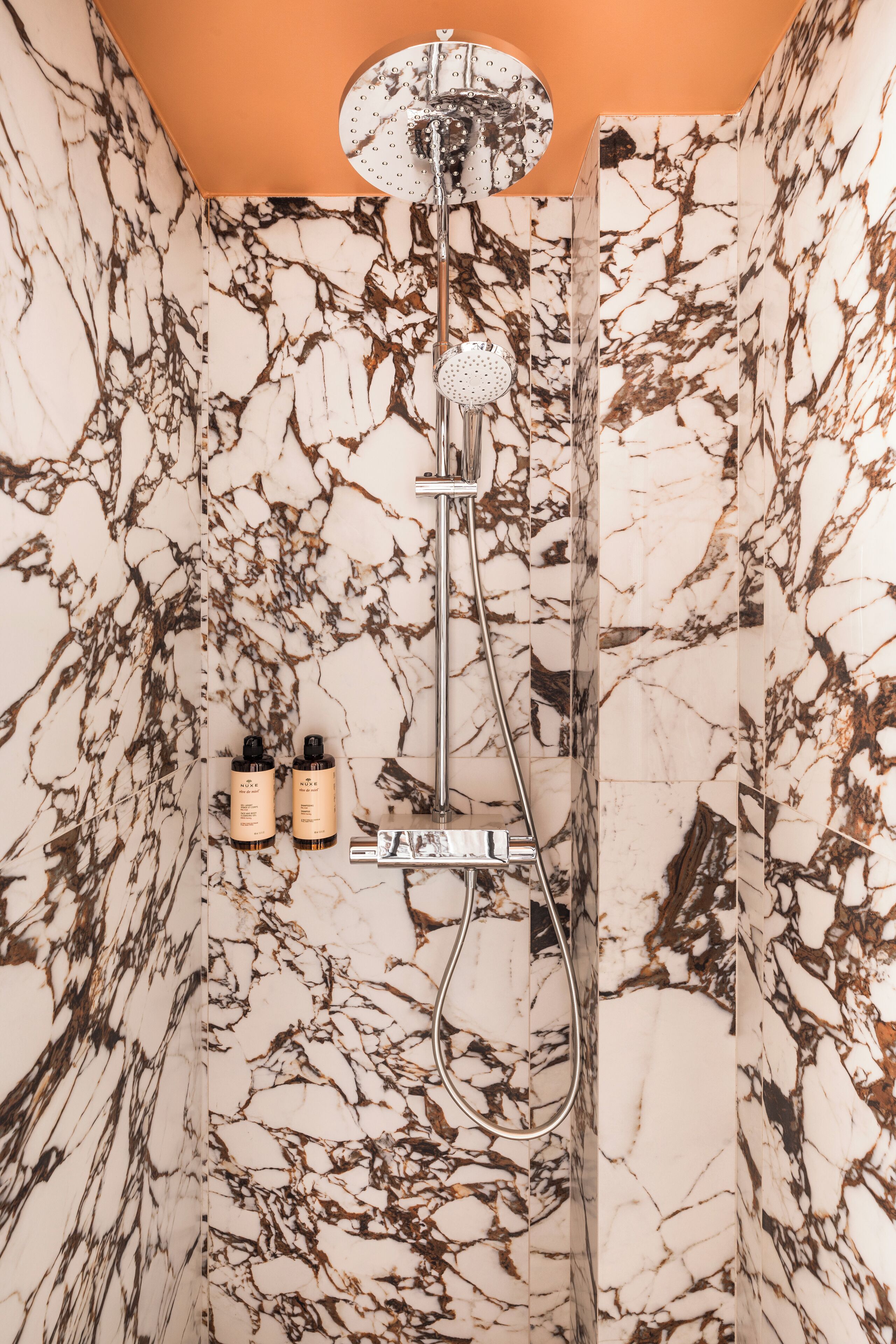 superior room | bathroom | shower, rainfall showerhead, designer toiletries, hair dryer