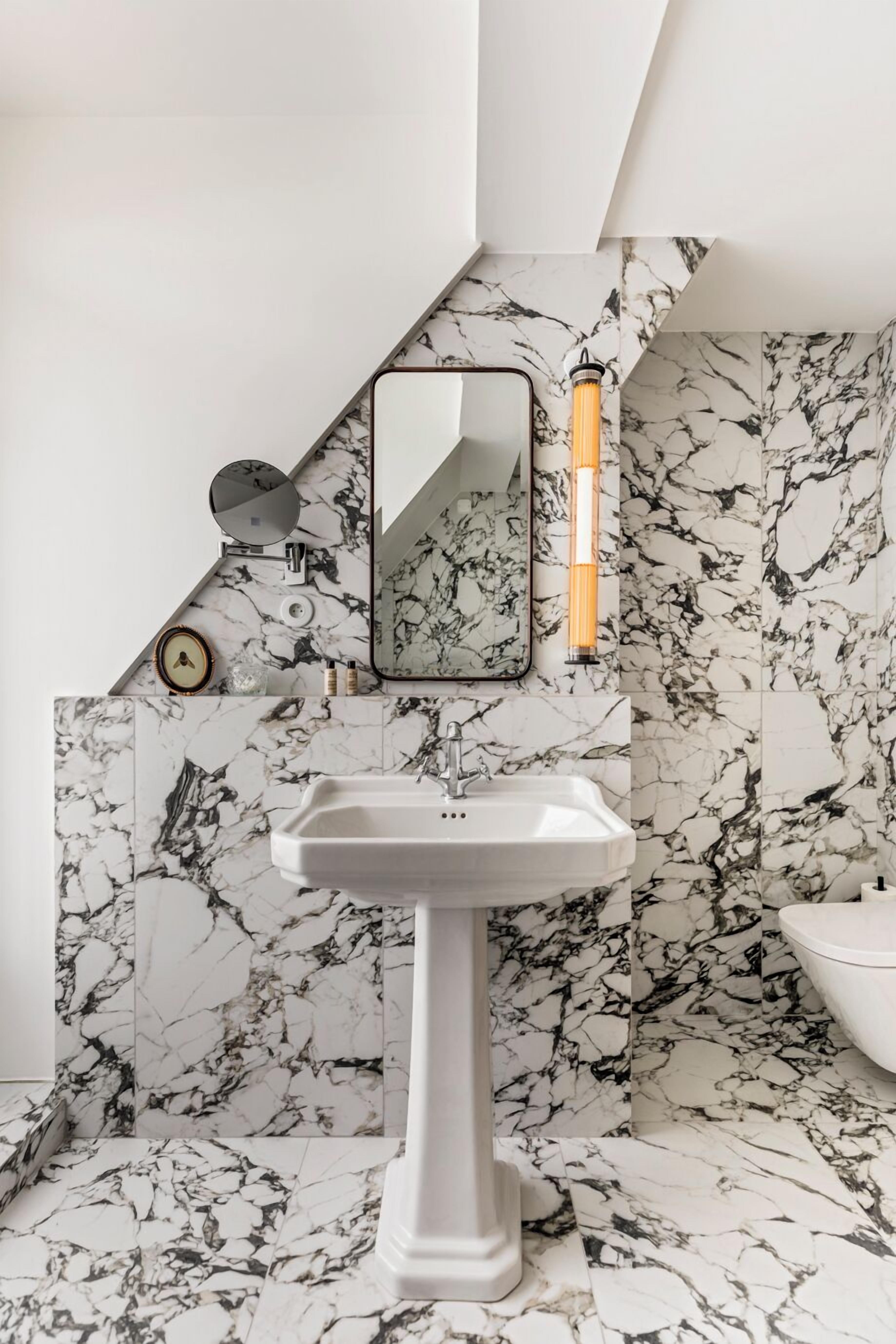 following the roofs of paris | bathroom | shower, rainfall showerhead, designer toiletries, hair dryer