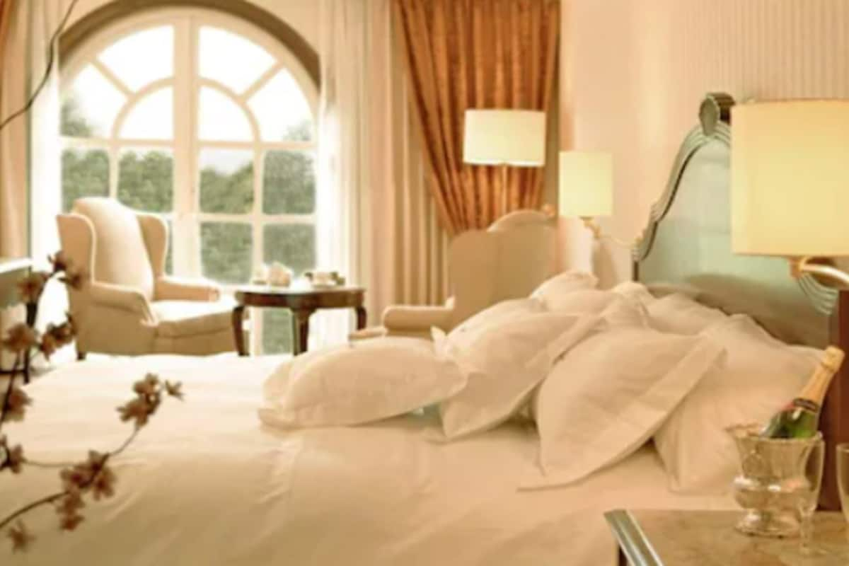 Grand Suite, 1 King Bed, Park View | Down comforters, in-room safe, individually decorated