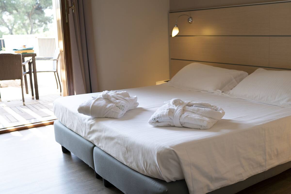 Suite – junior | Minibar, safe på rommet, blendingsgardiner og lydisolert