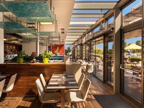 Breakfast, lunch, dinner served; garden views 