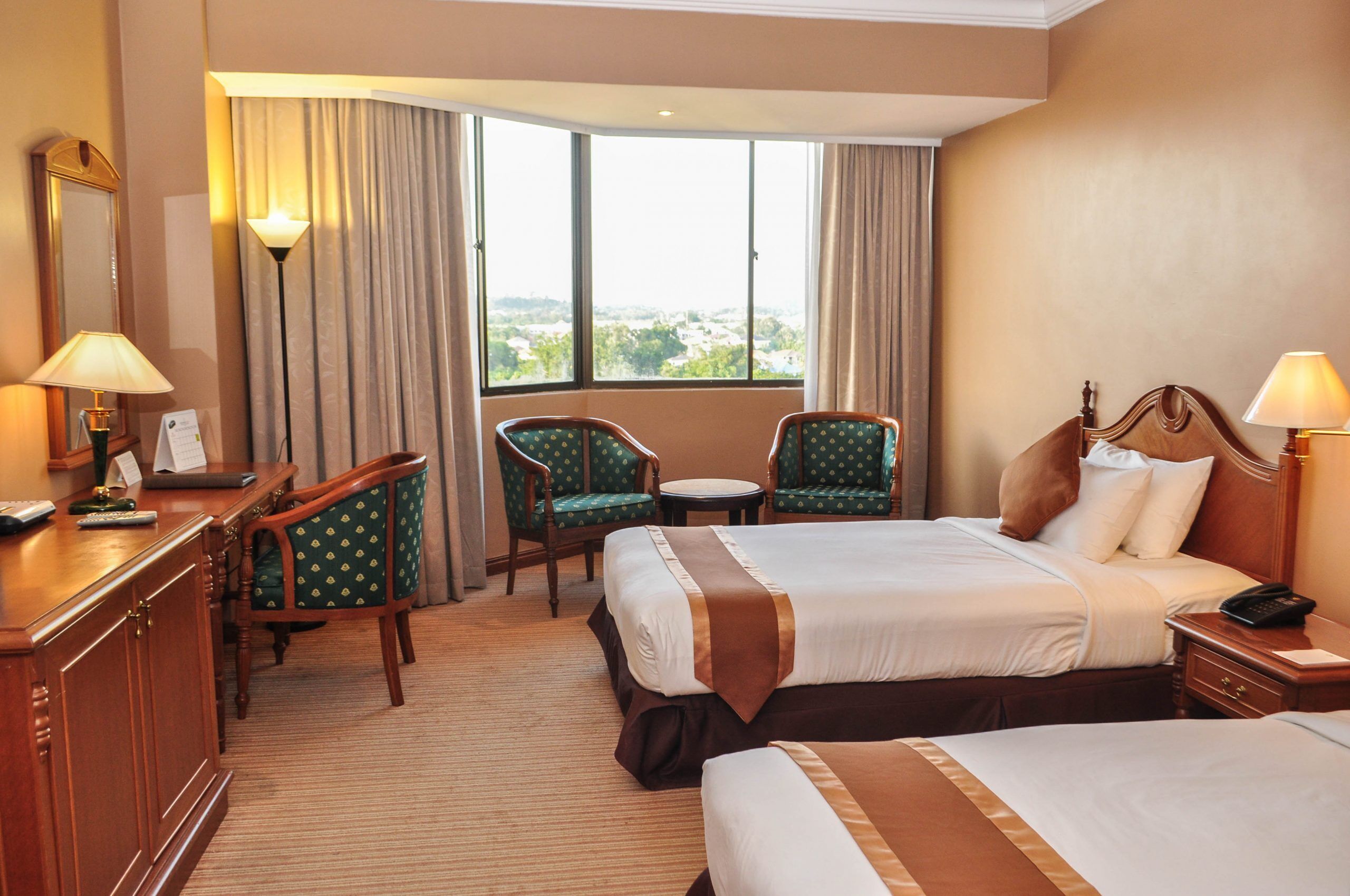 deluxe room | minibar, in-room safe, desk, laptop workspace