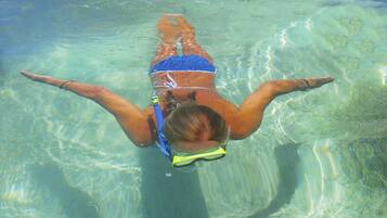 Private beach, white sand, sun-loungers, beach umbrellas