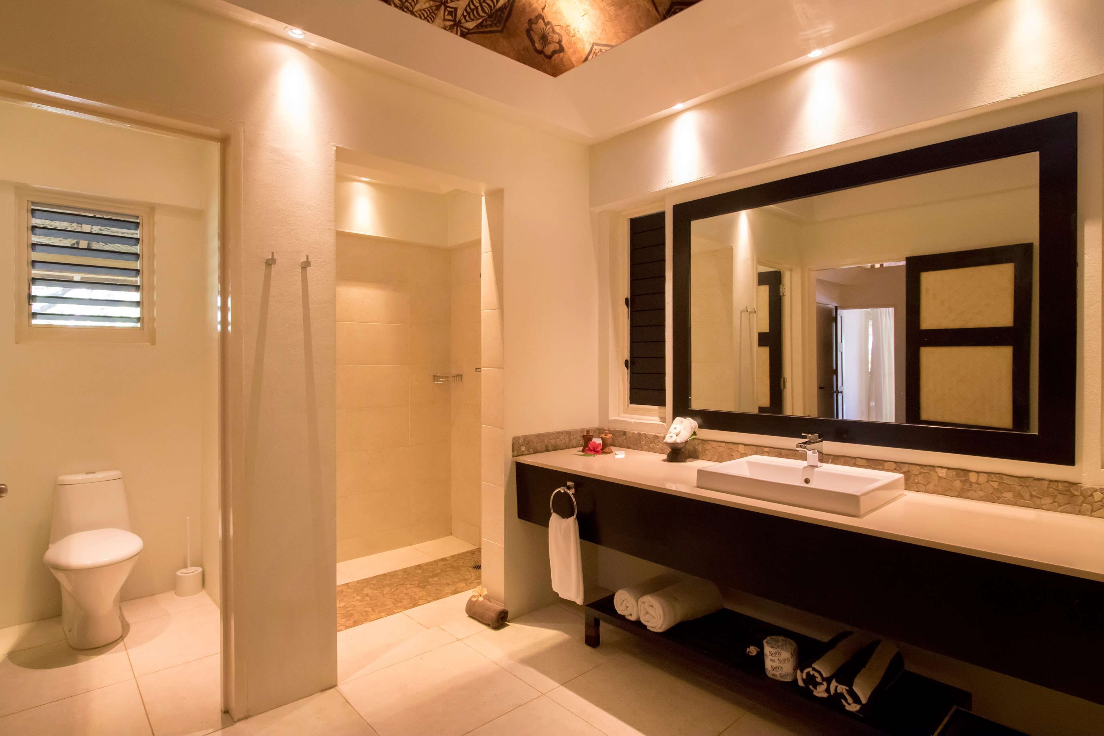 grand room (bure) | bathroom | shower, free toiletries, hair dryer, bathrobes