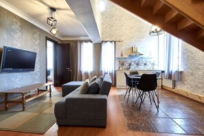 Duplex (Suite) | Living area | 130-cm LED TV with satellite channels, TV, heated floors - Iliani Hotel (Tbilisi)