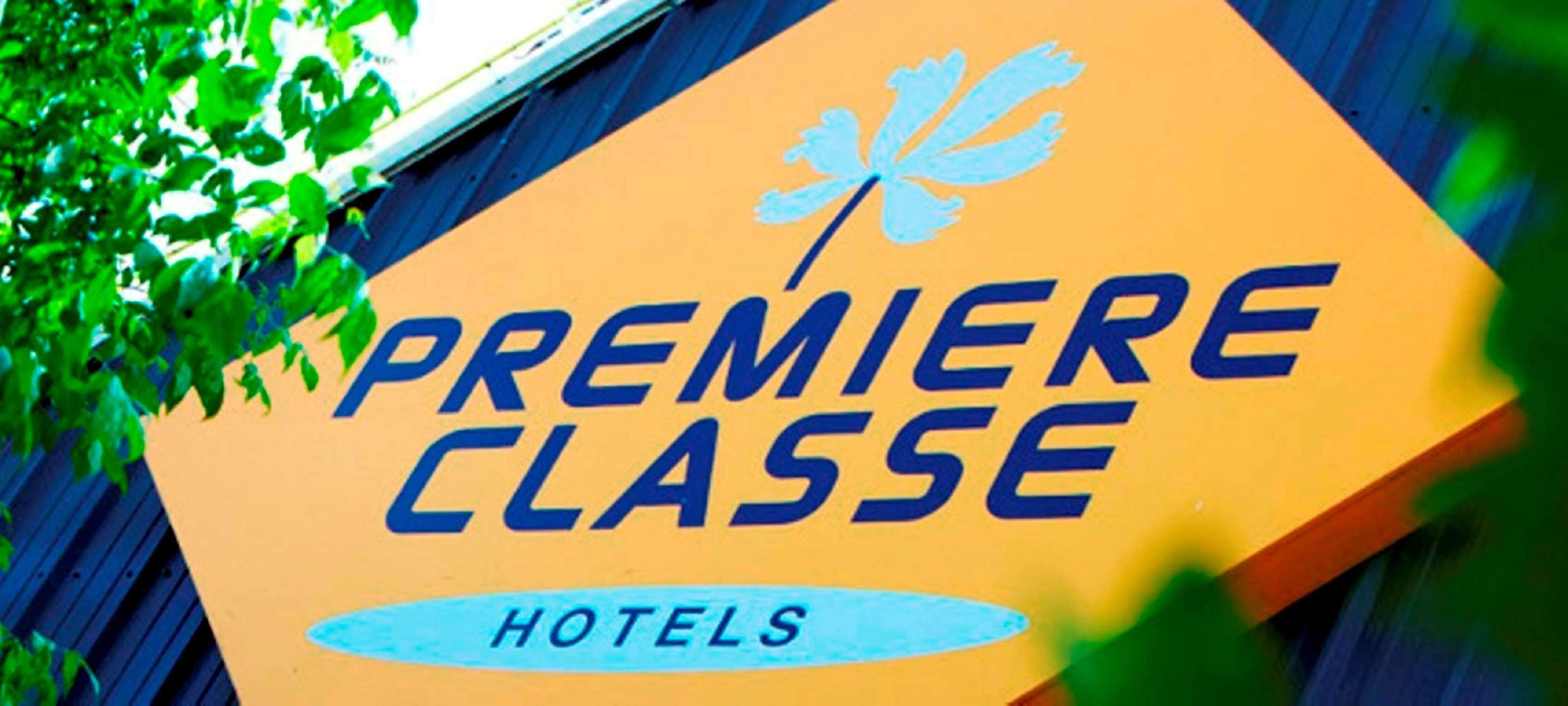 A sign for Premiere Classe Hotels.