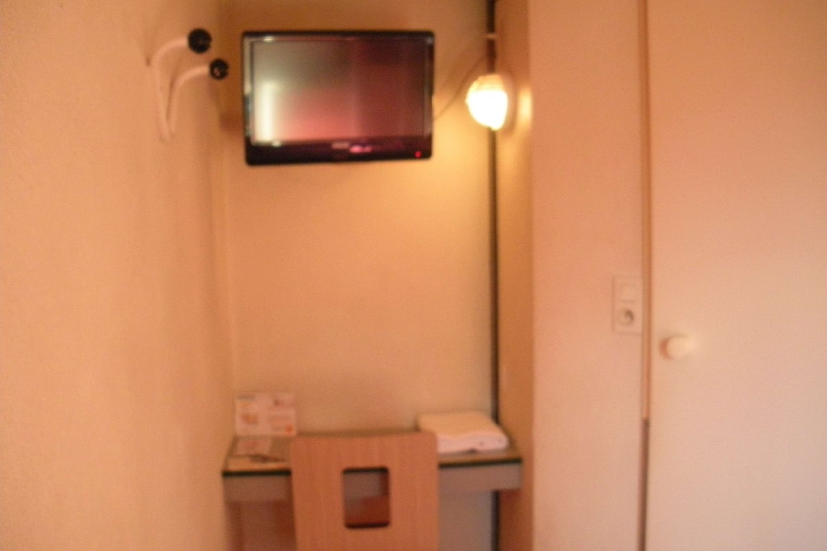 Desk, blackout curtains, free WiFi, bed sheets