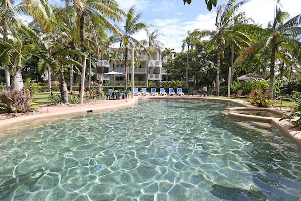 Outdoor pool, pool umbrellas, pool loungers