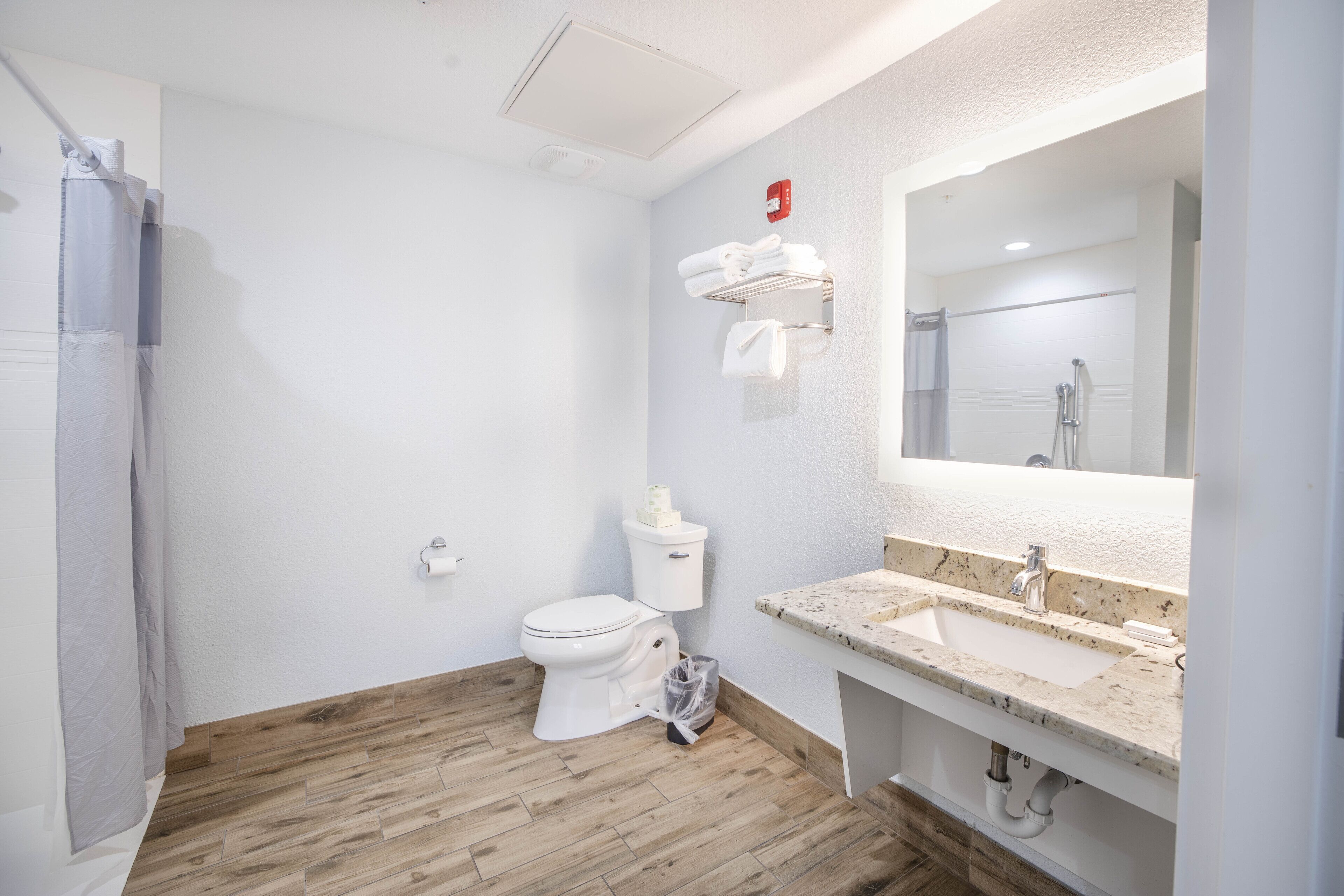 suite, 1 king bed with sofa bed (located across the street) | bathroom | shower, free toiletries, hair dryer, towels