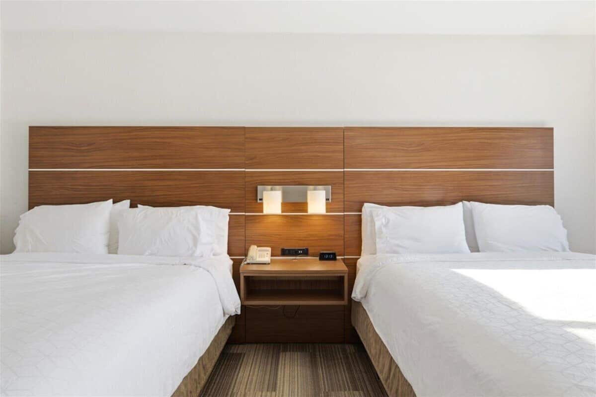 Desk, laptop workspace, blackout drapes, iron/ironing board