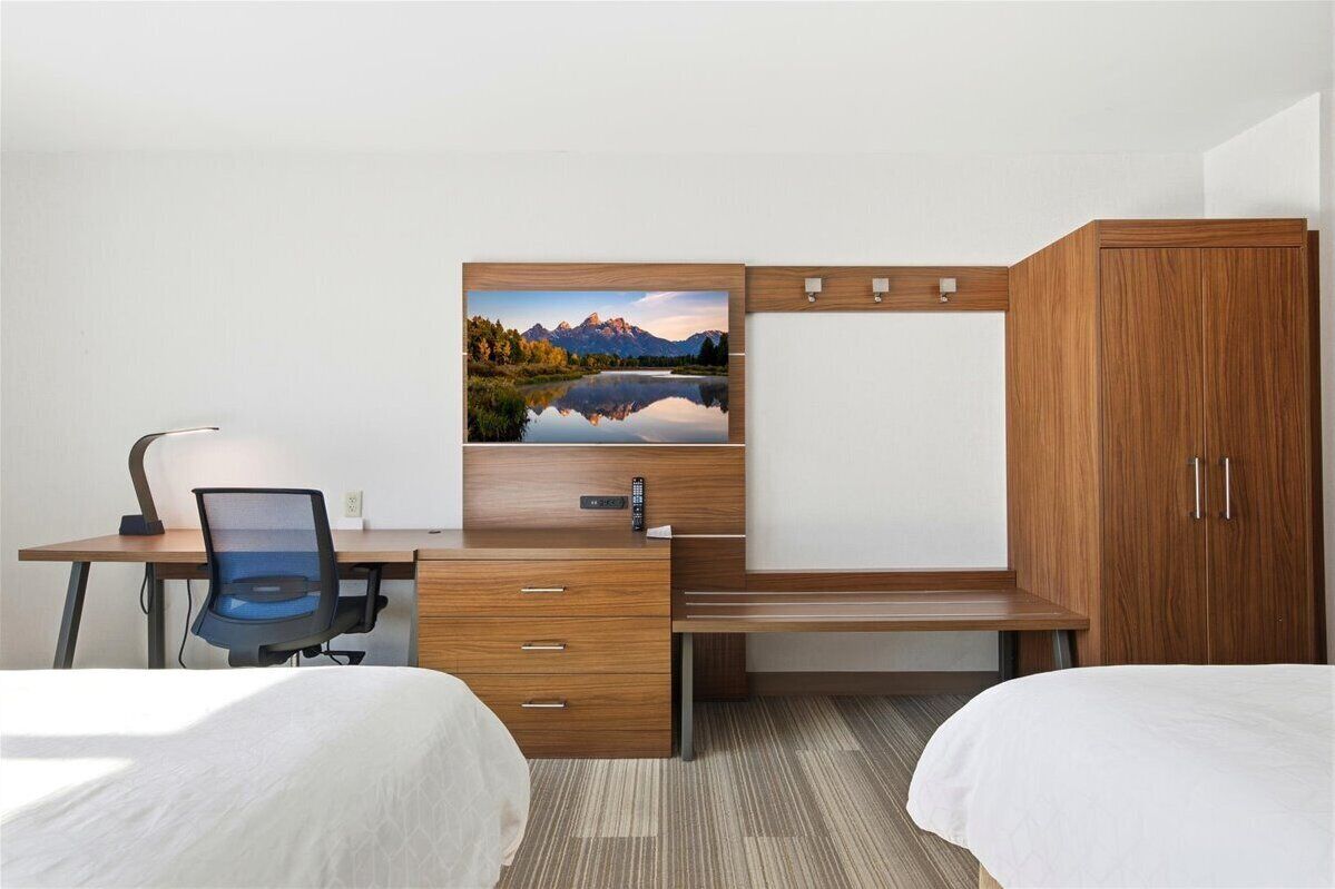 Desk, laptop workspace, blackout drapes, iron/ironing board