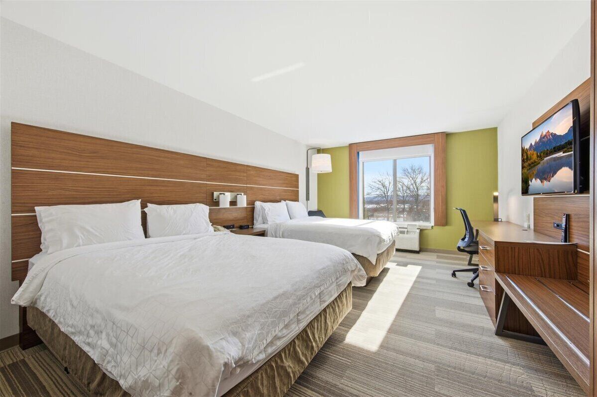 Desk, laptop workspace, blackout drapes, iron/ironing board