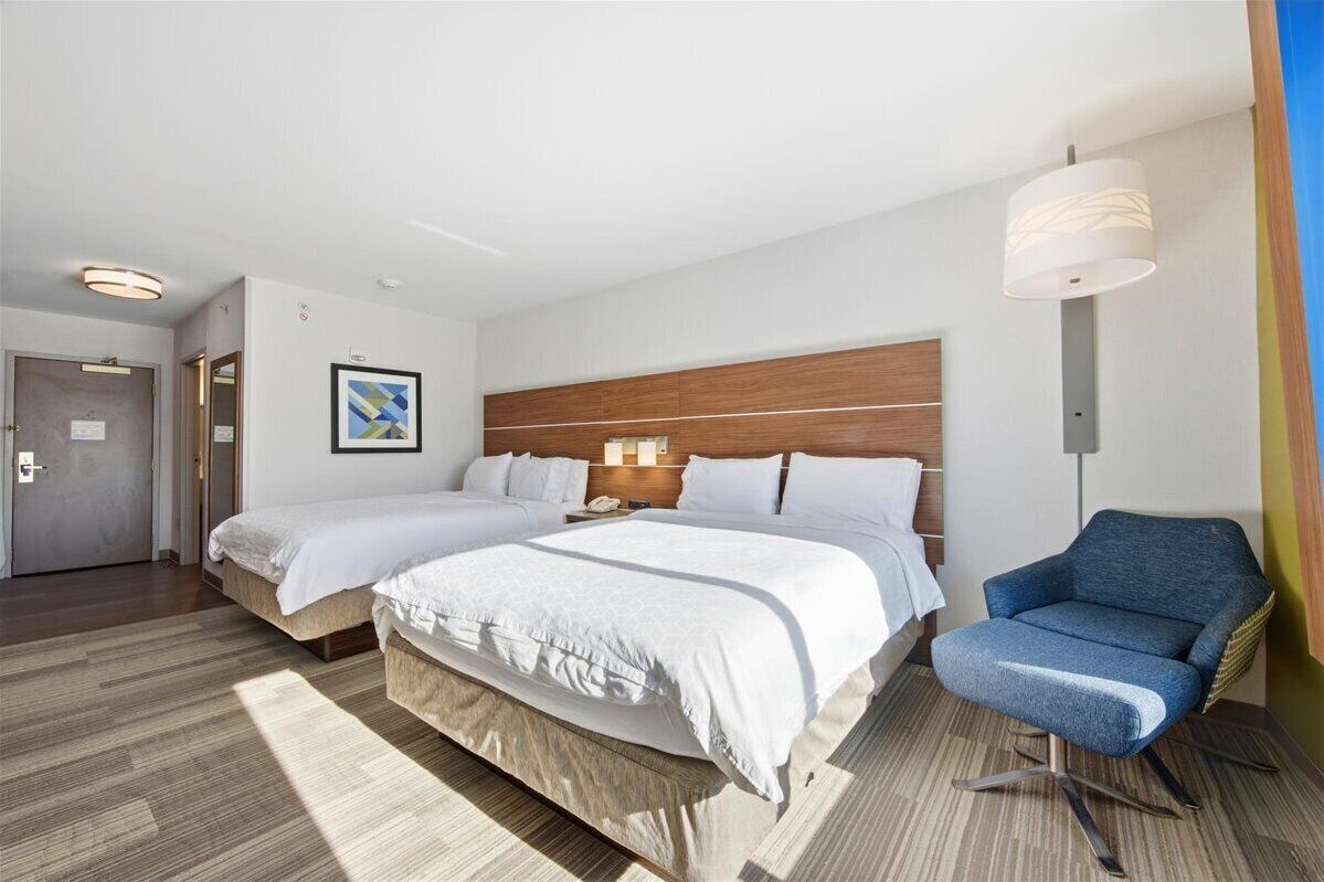 Desk, laptop workspace, blackout drapes, iron/ironing board