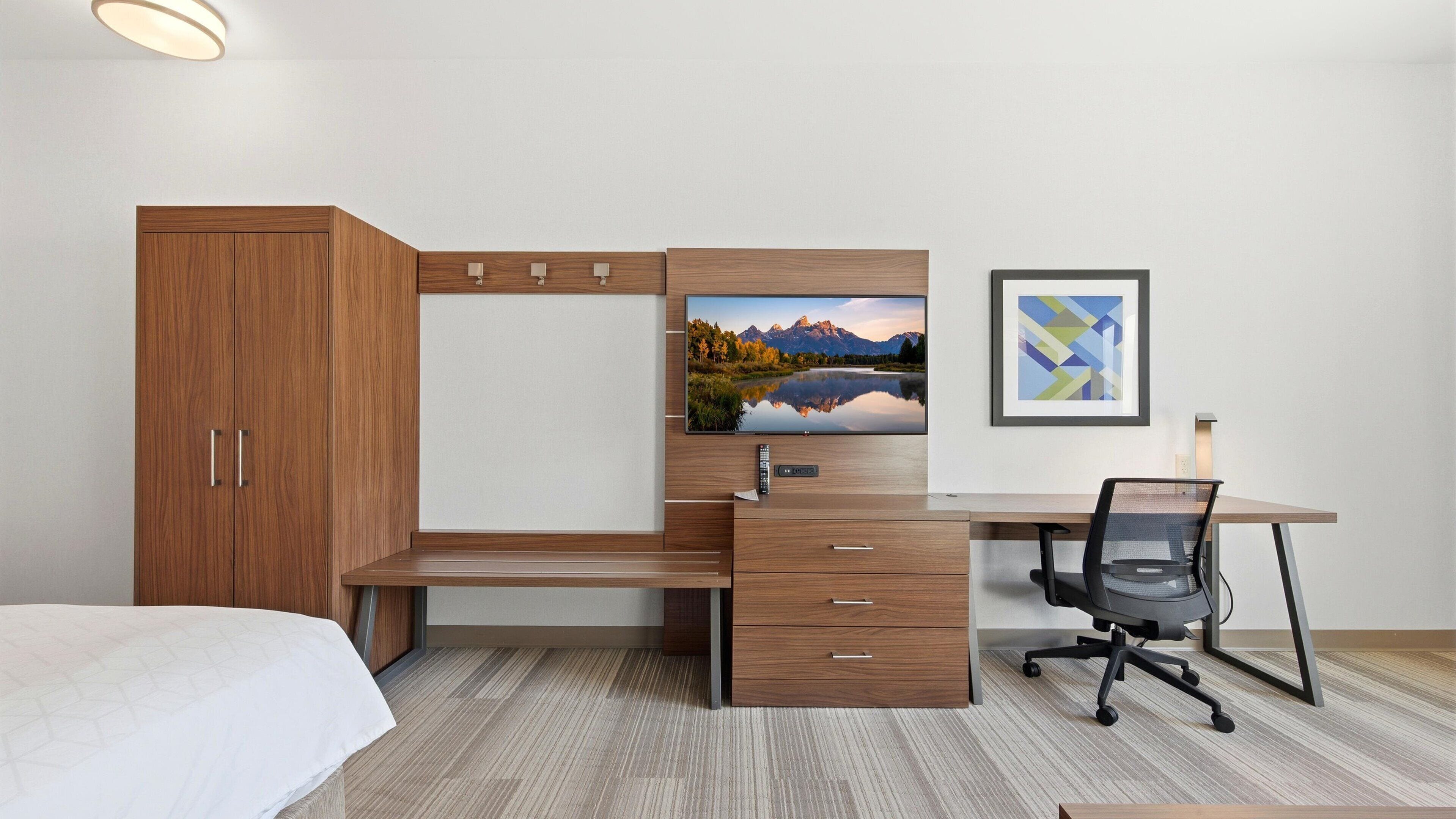 Desk, laptop workspace, blackout drapes, iron/ironing board