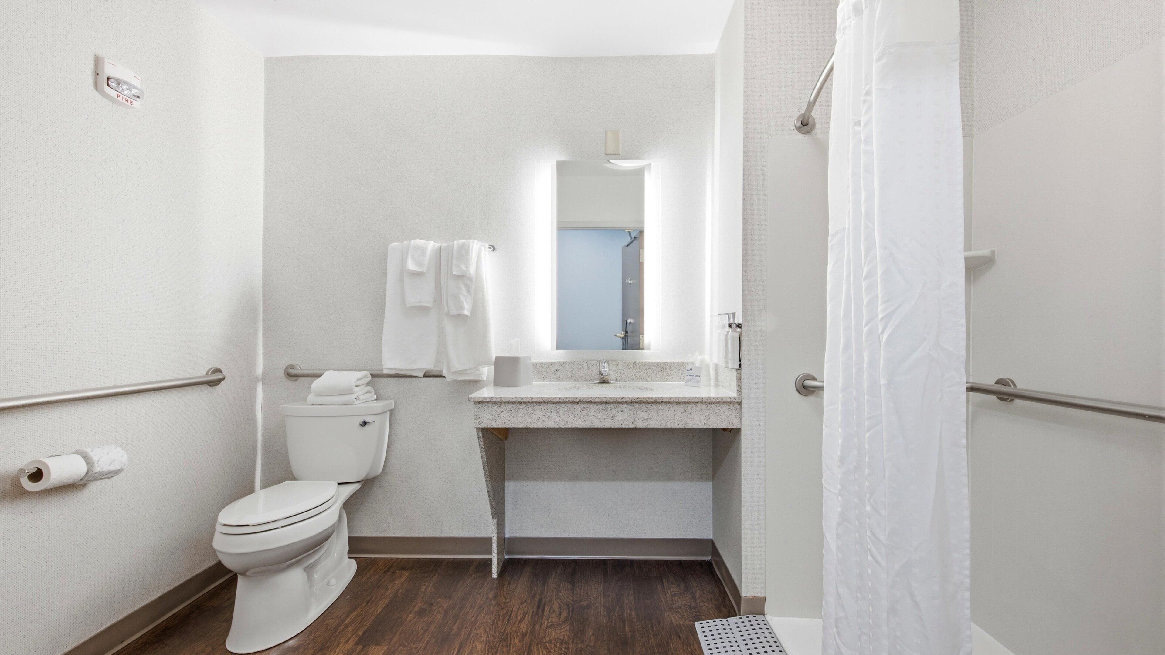 Suite, 2 Queen Beds, Mobility Accessible (Roll-In Shower) | Bathroom | Combined shower/tub, designer toiletries, hair dryer, towels