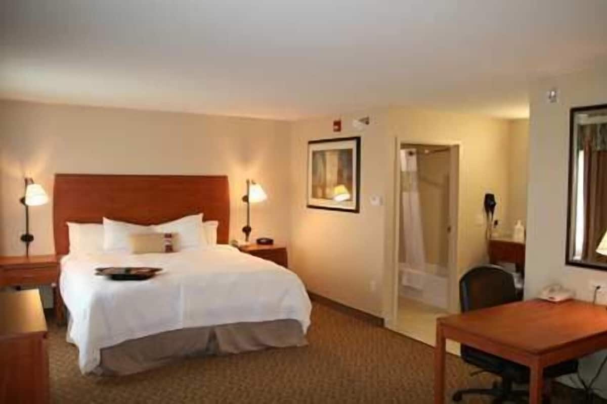 Premium bedding, down duvets, blackout curtains, iron/ironing board