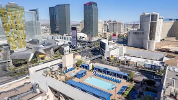 Seasonal outdoor pool, open 8:00 AM to 10:00 PM, pool umbrellas