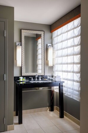 Combined shower/tub, designer toiletries, hair dryer, bathrobes