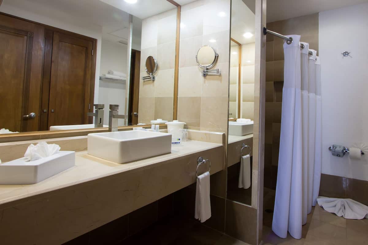 shower, rainfall showerhead, designer toiletries, hair dryer