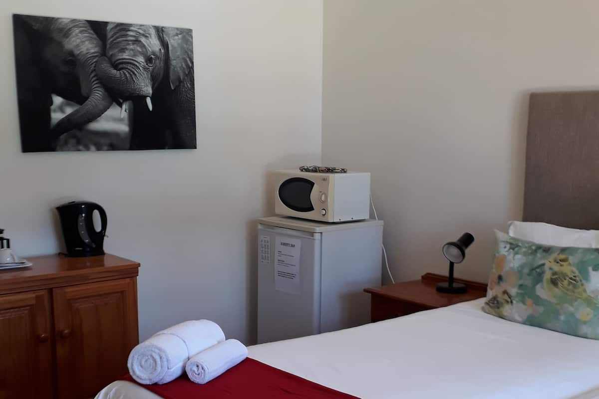 Familie suite | Luxe beddengoed, een minibar, een kluis op de kamer