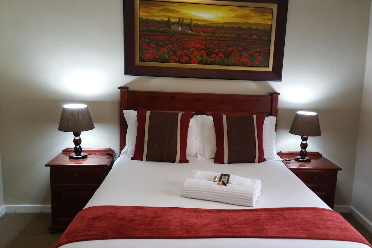 Comfort Room, 1 Bedroom (Rm 8, Double bed, garden view) | 1 bedroom, minibar, in-room safe, desk