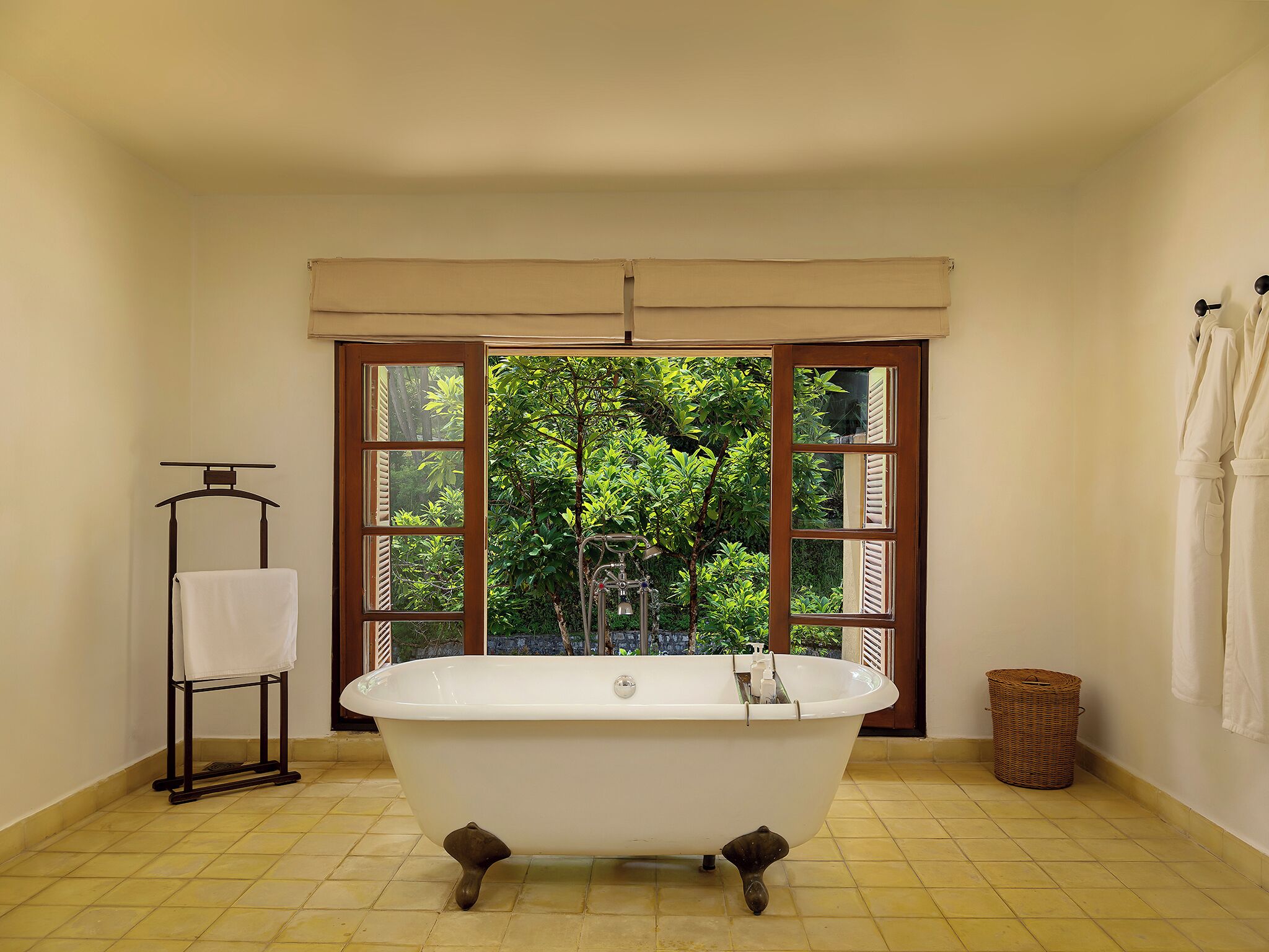 villa suite | bathroom | combined shower/bathtub, eco-friendly toiletries, hair dryer, bathrobes