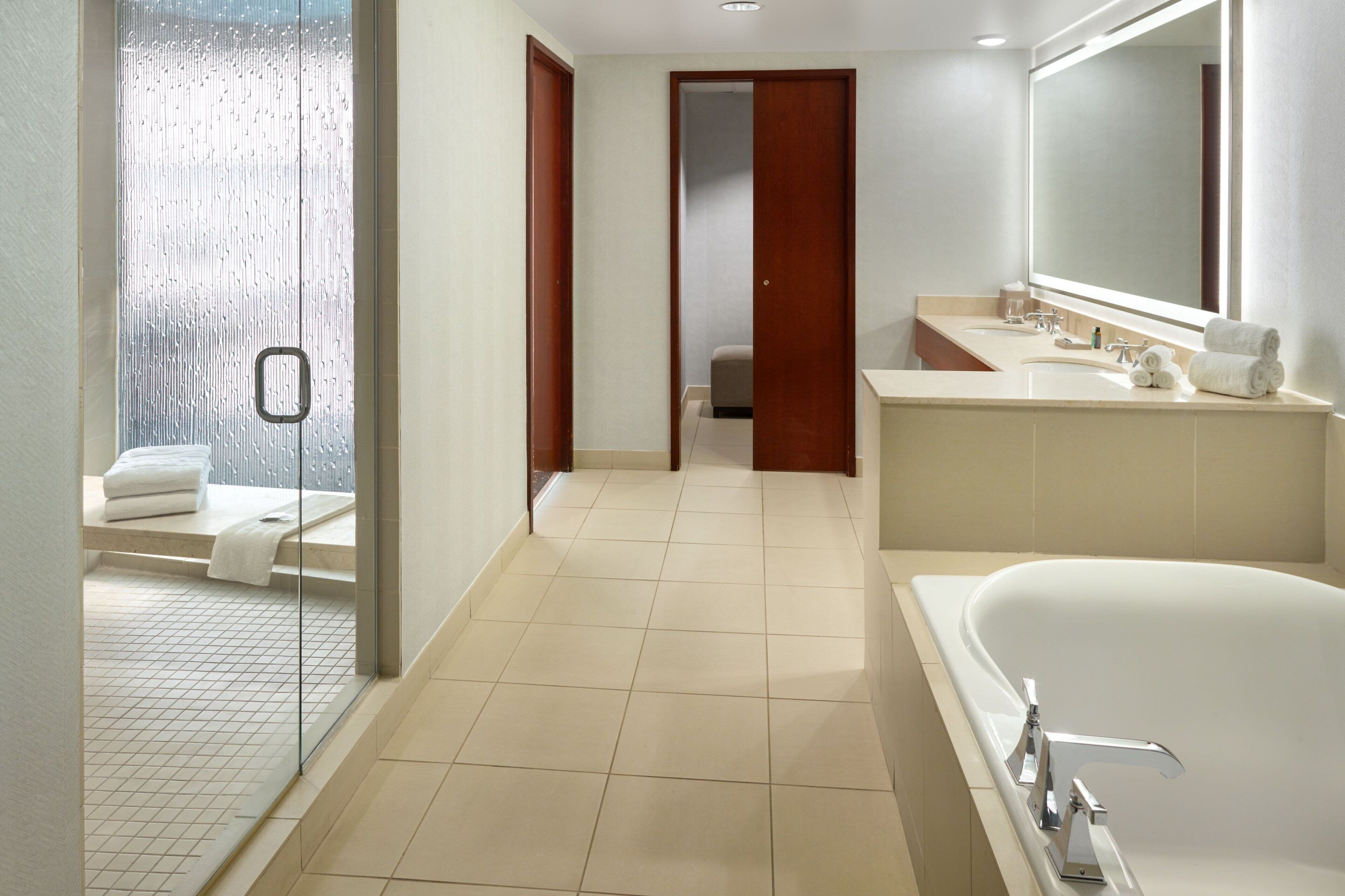 separate bathtub and shower, designer toiletries, hair dryer, bathrobes