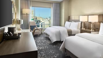 Ropa de cama hipoalergénica, camas con pillow-top y minibar