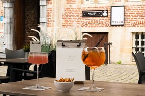 Breakfast, lunch served; international cuisine, al fresco dining 