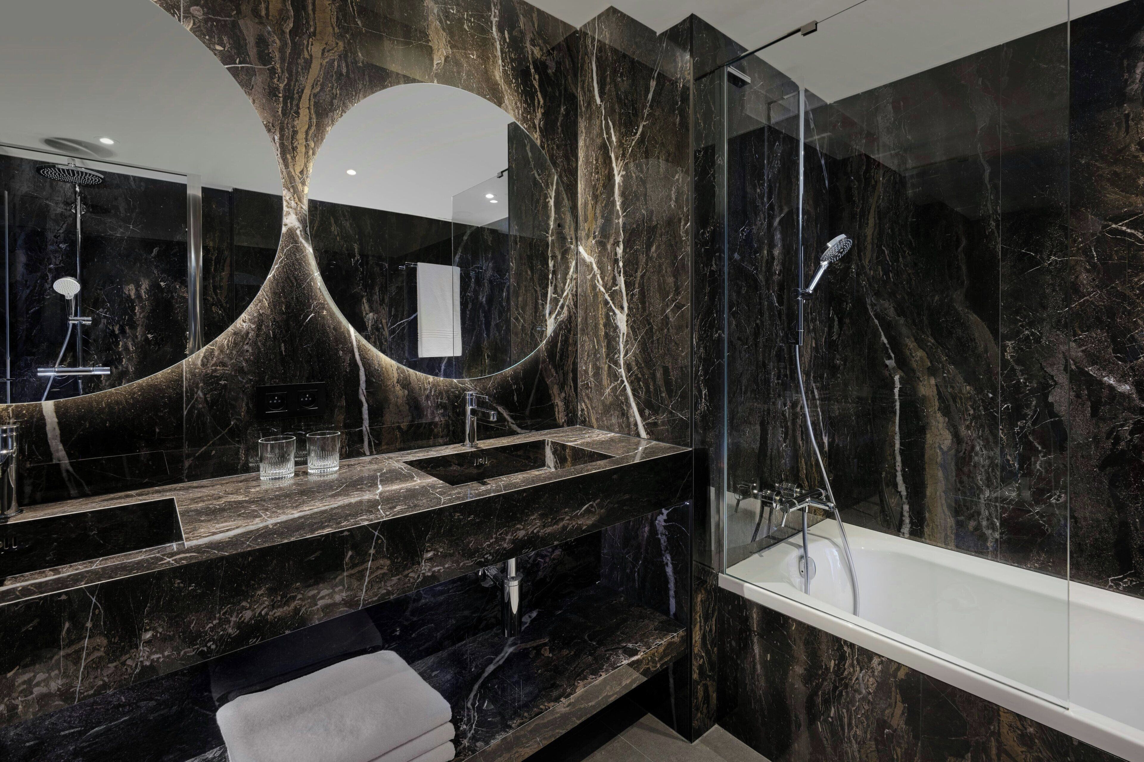 combined shower/bathtub, free toiletries, hair dryer, bathrobes