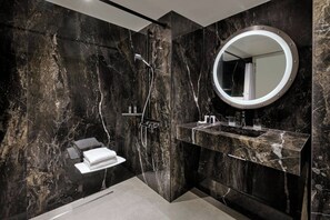 Combined shower/tub, free toiletries, hair dryer, bathrobes