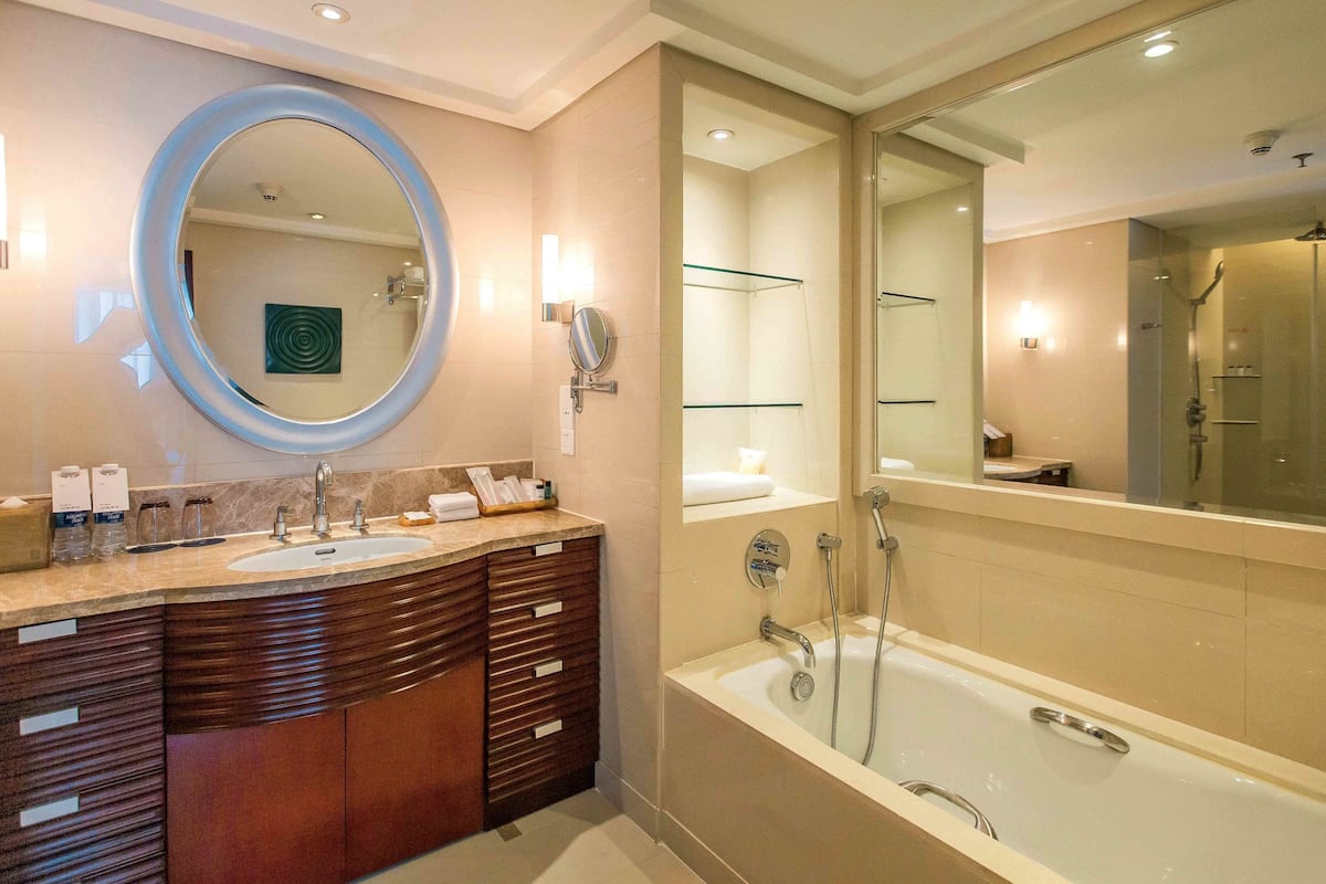 separate bathtub and shower, free toiletries, hair dryer, bathrobes