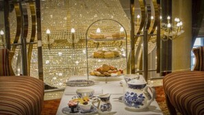A dining area with a table set for breakfast, including pastries and a teapot. - Knightsbrook Hotel Spa & Golf Resort (Trim)