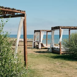 Private beach, free beach shuttle, sun loungers, beach umbrellas