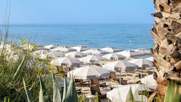 Playa privada, traslado desde/hacia la playa gratis