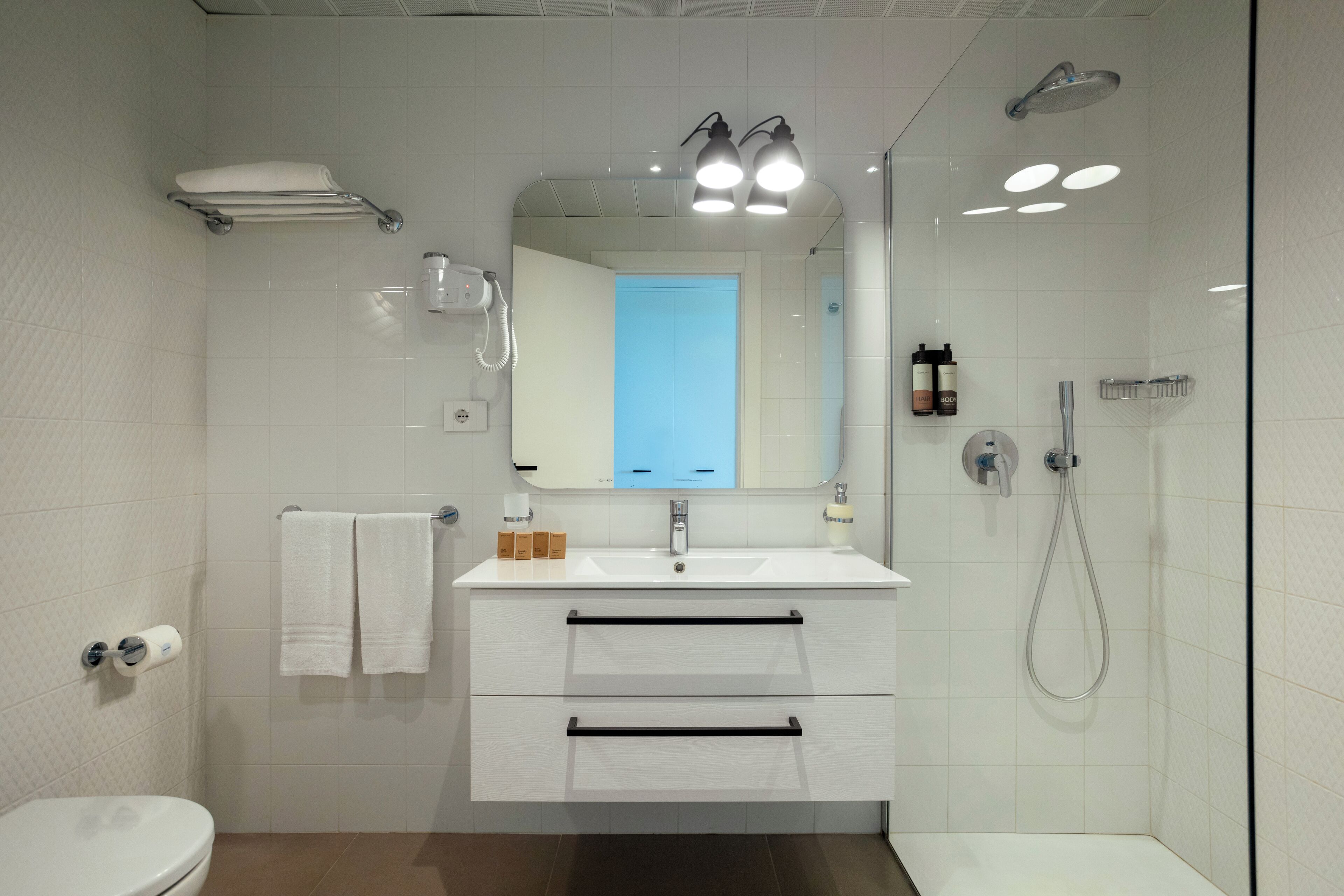 shower, free toiletries, hair dryer, bathrobes