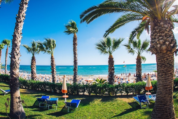 Private beach, sun loungers, beach umbrellas