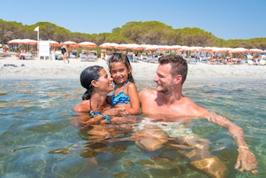 Private beach nearby, sun loungers, beach umbrellas, windsurfing