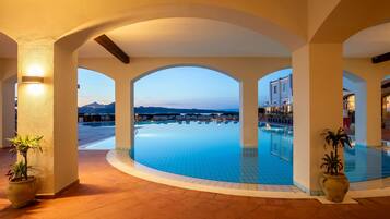 2 outdoor pools, pool umbrellas, pool loungers