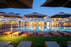 2 outdoor pools, pool umbrellas, pool loungers