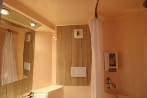 Shower, rainfall showerhead, eco-friendly toiletries, towels