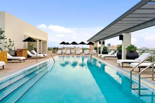 Outdoor pool, pool umbrellas, pool loungers