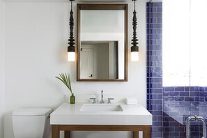 Shower, designer toiletries, hair dryer, bathrobes