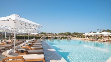 2 outdoor pools, pool umbrellas, sun loungers