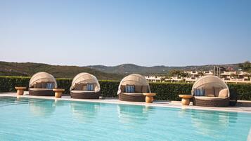 2 outdoor pools, pool umbrellas, pool loungers