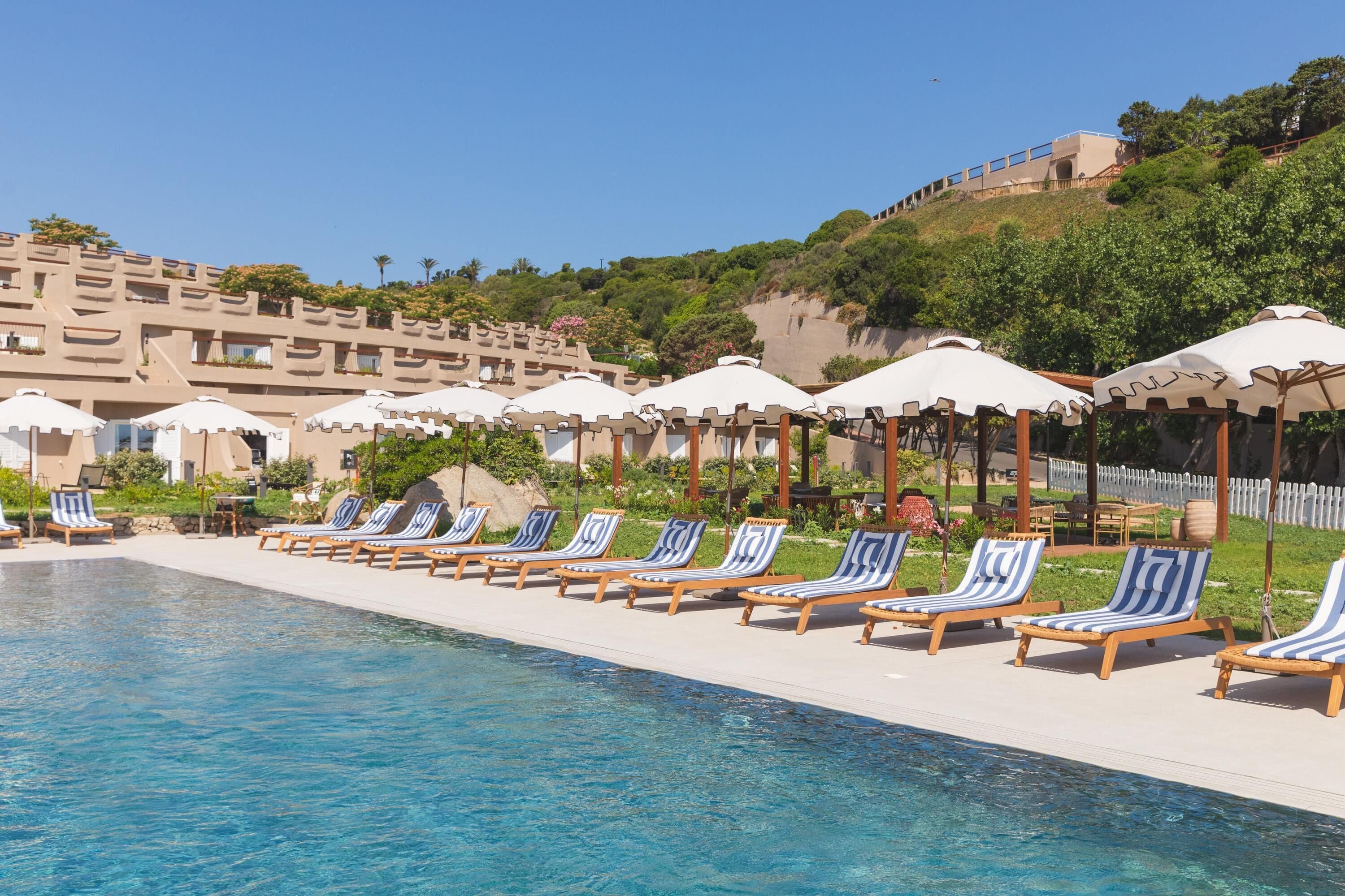 2 outdoor pools, pool umbrellas, pool loungers